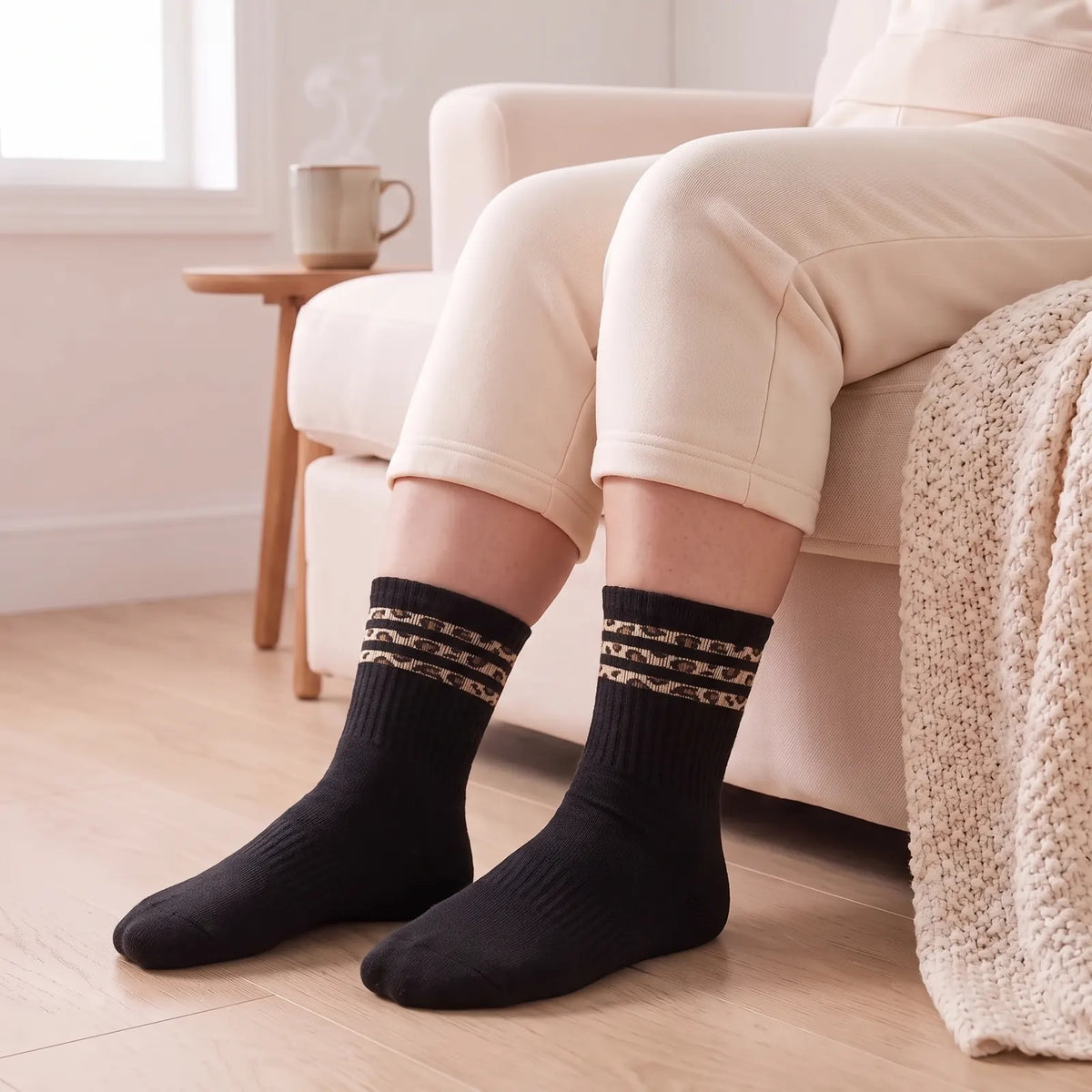 Black crew socks with leopard stripes worn