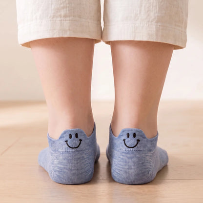 Blue smile ankle socks worn