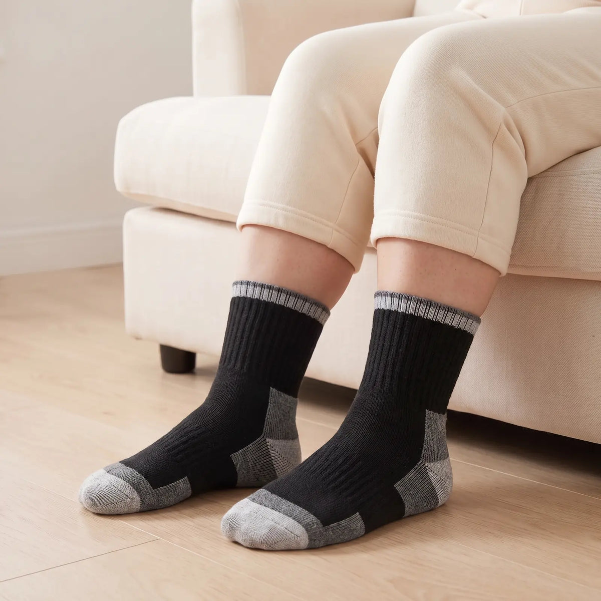 Black thermal socks worn